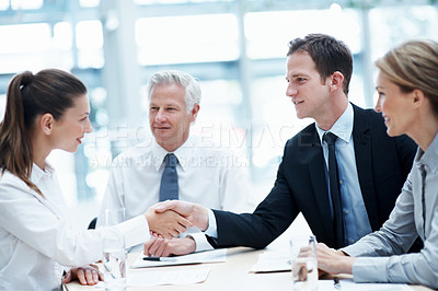 Buy stock photo Shaking hands, discussion and business people in office for deal, agreement or legal settlement. Team, meeting and attorneys with general counsel for handshake on court case, law or mediation process