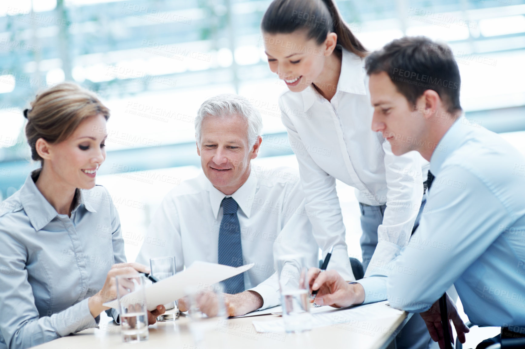Buy stock photo Business, meeting or team in office with paper, strategy insight or feedback in budget review. Collaboration, people or finance advisor with document, funding evaluation or forecast in revenue report