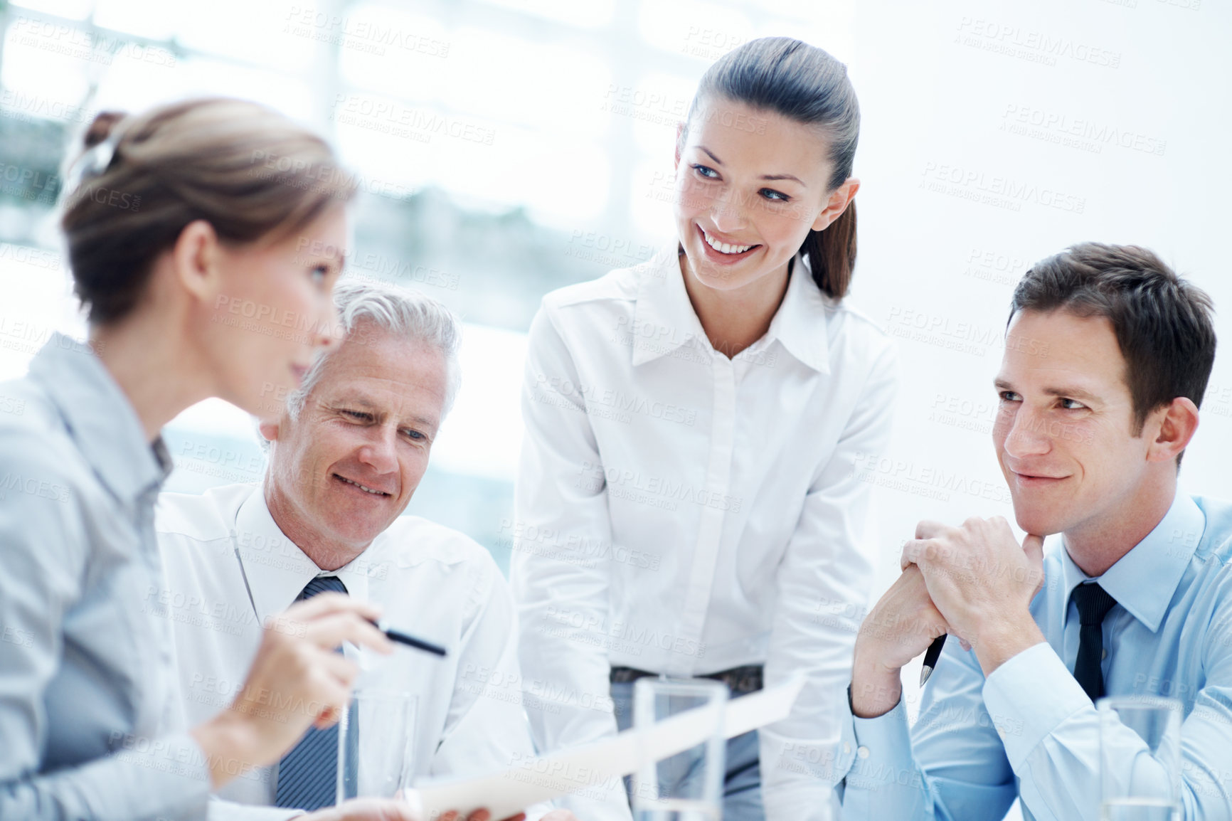 Buy stock photo Business, meeting or team in agency with paper, strategy plan or feedback in budget review. Collaboration, people or finance advisors with document, funding evaluation or forecast in revenue report.