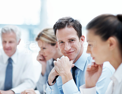 Buy stock photo Confident, smile and businessman with team in meeting, wealth management and pride for career growth. Corporate, portrait and happy person with colleagues, investment banking and business development