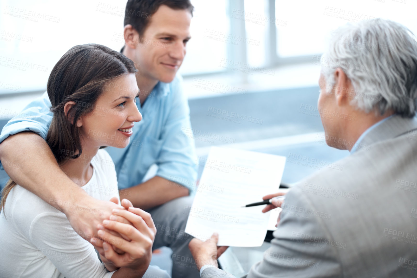 Buy stock photo Smile, documents and lawyer with couple in office for prenup agreement, meeting and advice. Marriage contract, legal advisor with man and woman in law firm for deal, estate planning and proposal