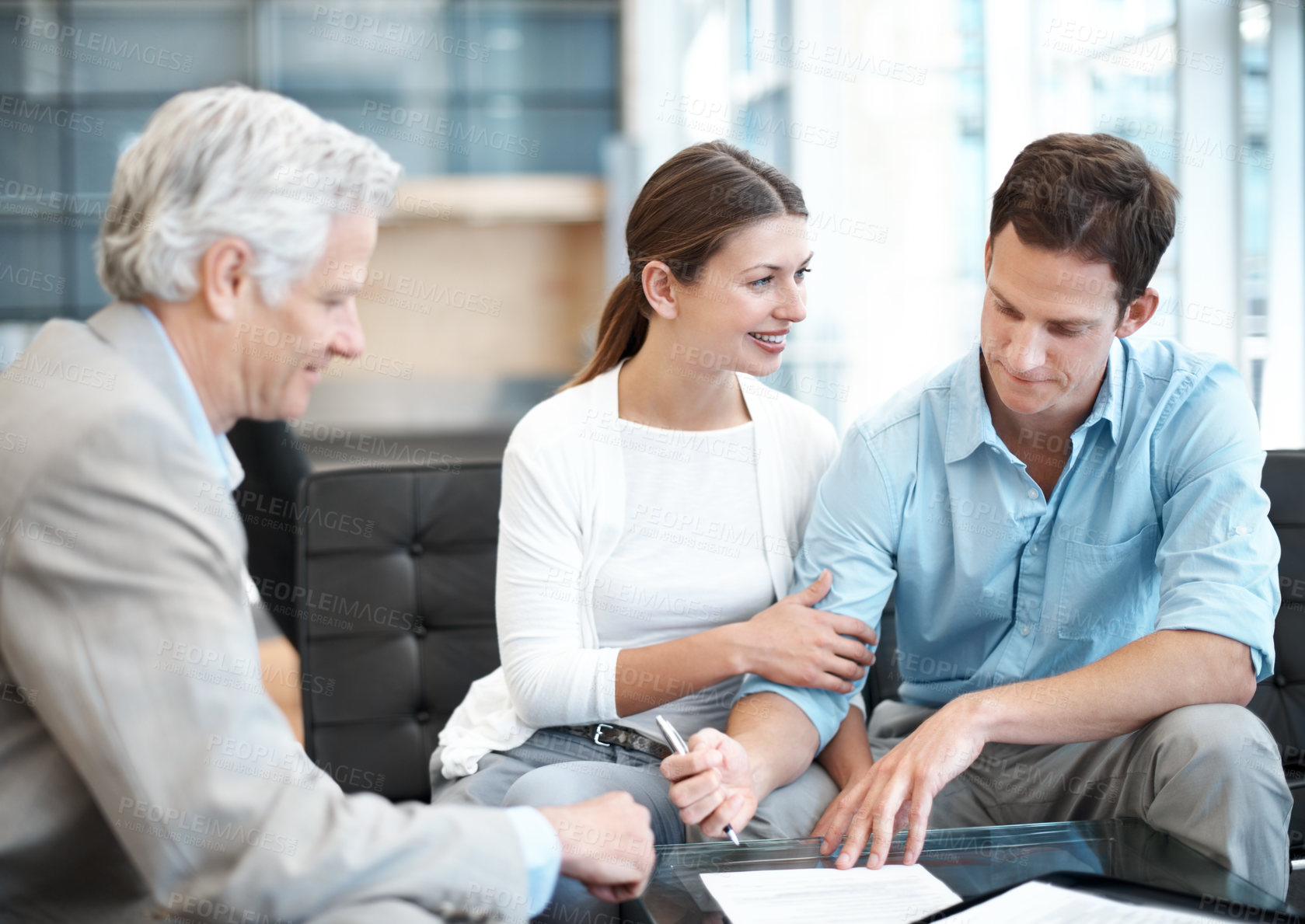 Buy stock photo Signature, meeting and lawyer with couple in office for prenup agreement, documents and advice. Marriage contract, legal advisor with man and woman in law firm for deal, estate planning and proposal