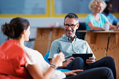 Buy stock photo Shot of a group of colleagues working in an office