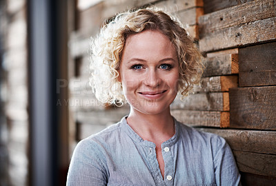 Buy stock photo Portrait of a young businesswoman standing in an office