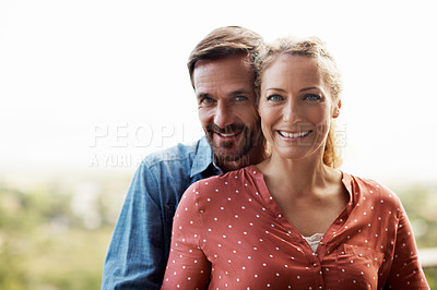 Buy stock photo Cropped portrait of an affectionate couple standing outside