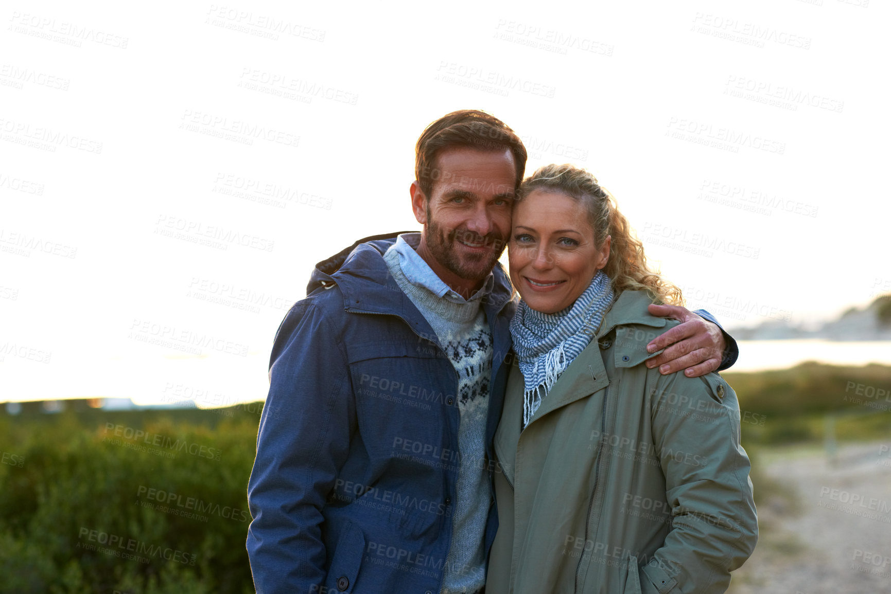 Buy stock photo Smile, portrait and hug with couple at beach for vacation, marriage connection and support. Happy, travel adventure and trust with man and woman outdoor for bonding, partners and holiday together