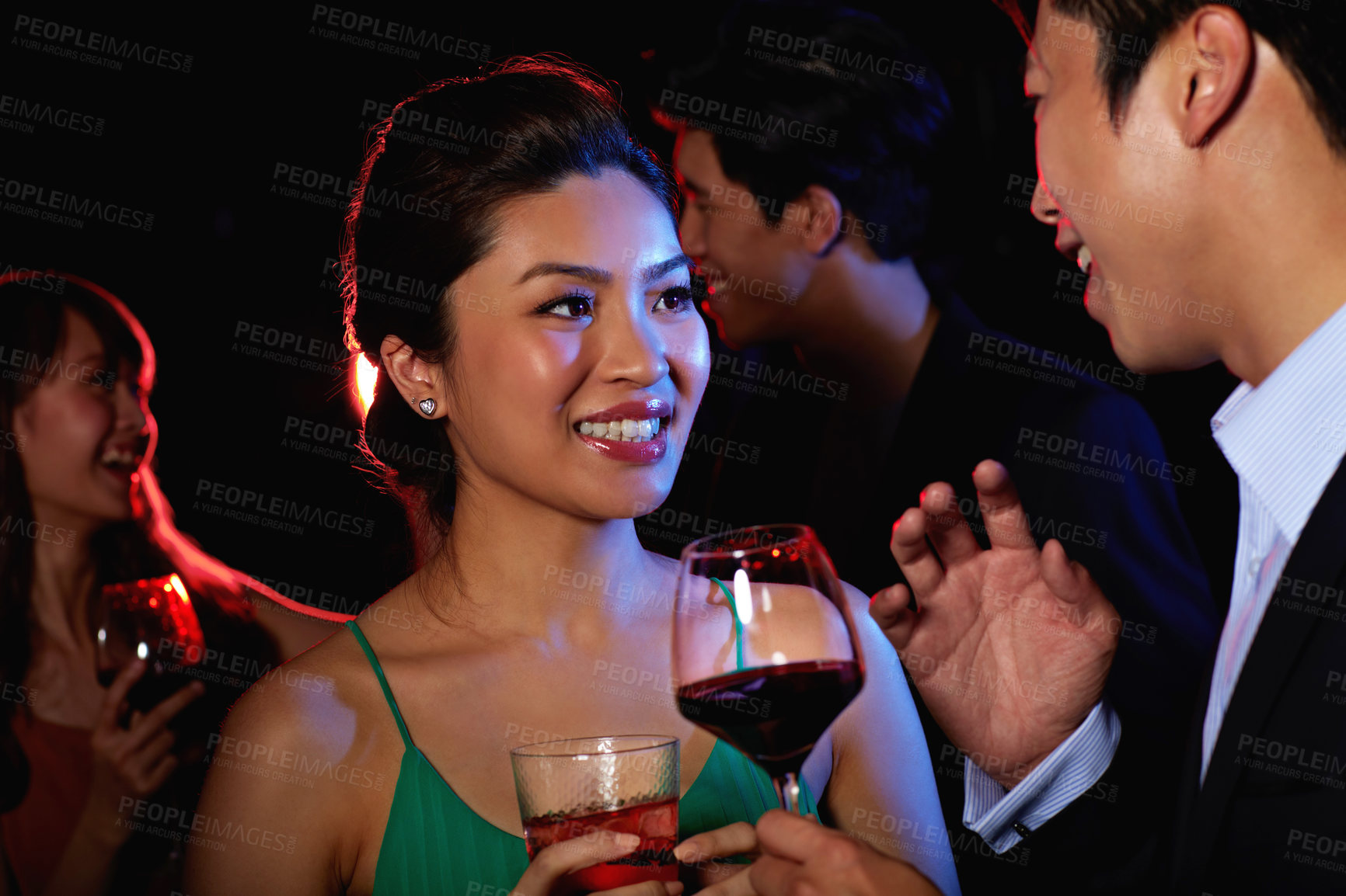 Buy stock photo Drink, wine and smile with asian couple in club for happy hour, hangout and social gathering. Party event, alcohol and discussion with people at night pub for bonding, weekend break and date