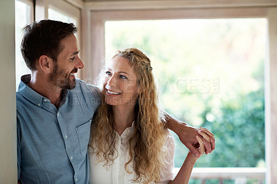 Buy stock photo Cropped shot of a couple standing in their home