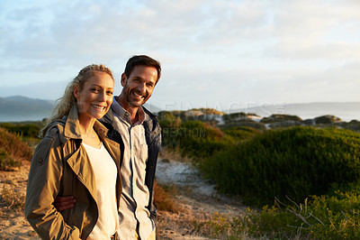 Buy stock photo Cropped shot of an affectionate couple standing outdoors