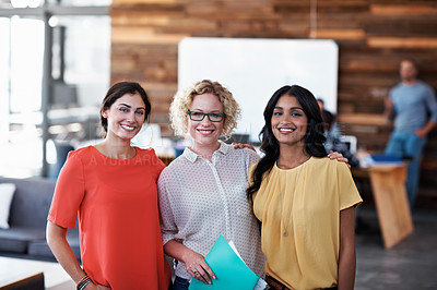 Buy stock photo Cropped portrait of three businesswomen in the office