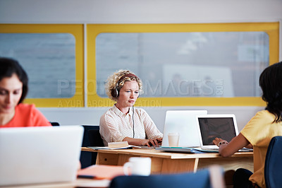 Buy stock photo Cropped shot of businesswomen working in the office
