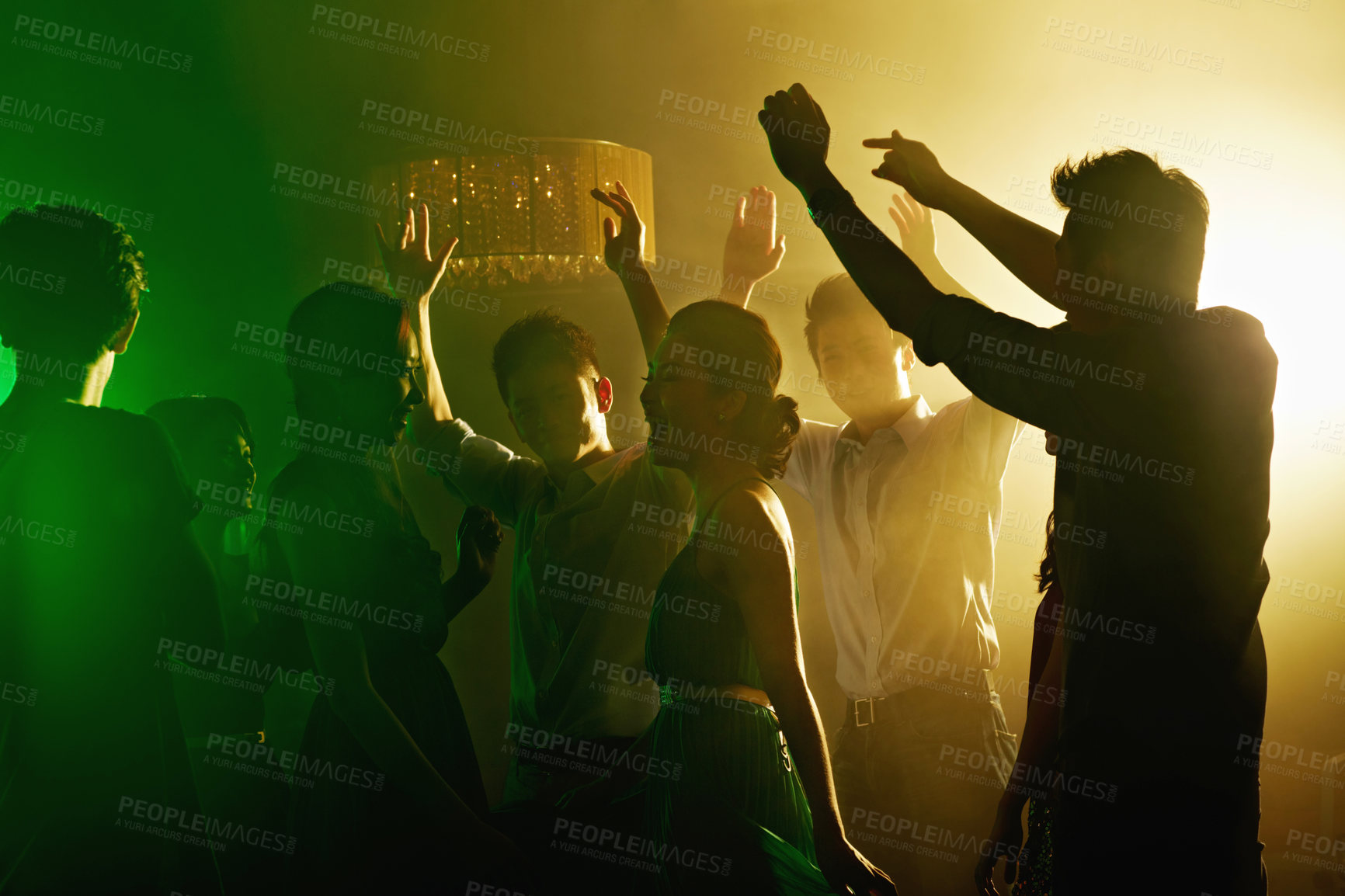Buy stock photo Happy, people and friends dancing at nightclub with energy, movement and rhythm at disco event. Group, laugh and reunion for New Years celebration, music festival and freedom or bonding for nightlife