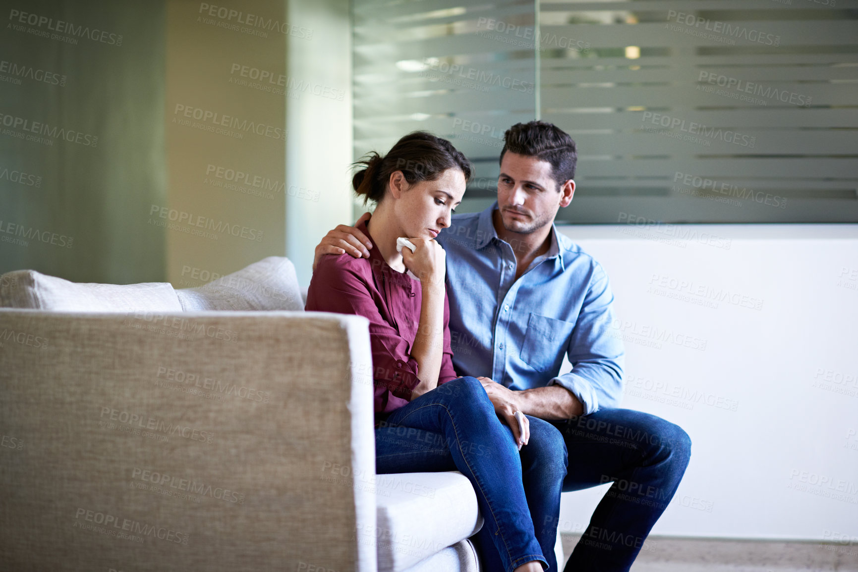 Buy stock photo Sad, couple and worry in waiting room with comfort, assurance and compassion for medical diagnosis. People, relationship and boyfriend console girlfriend in hospital with love, empathy and support.