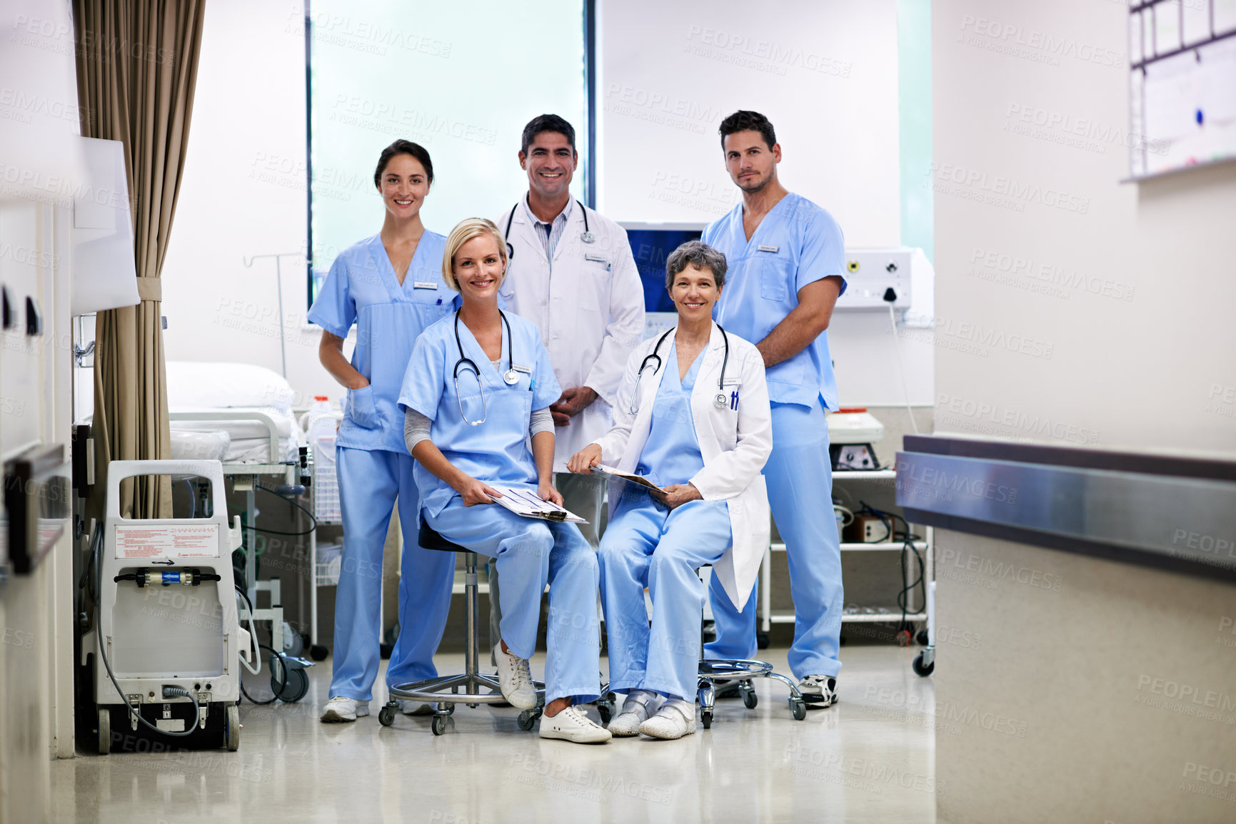Buy stock photo Portrait of successful team of doctors in a hospital