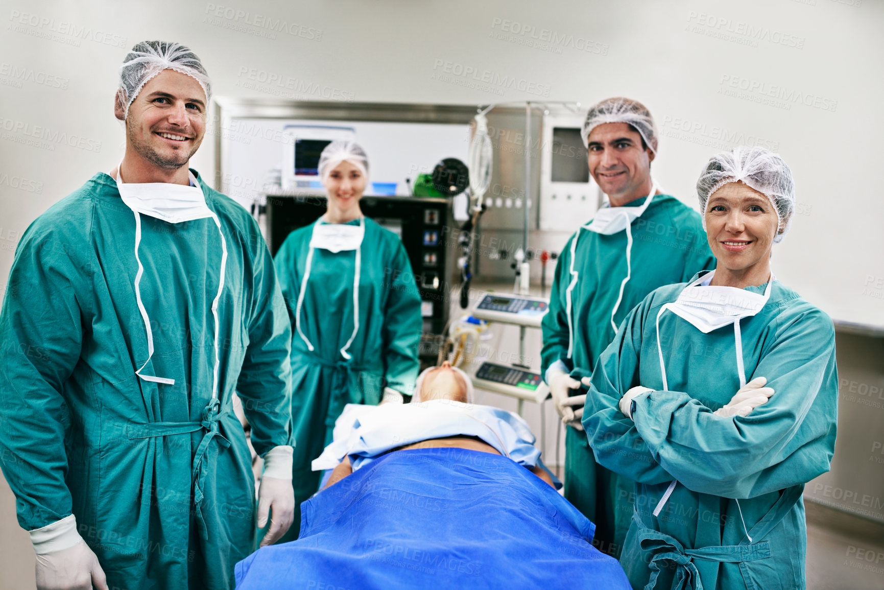 Buy stock photo Portrait of a team of surgeons in an operating theatre