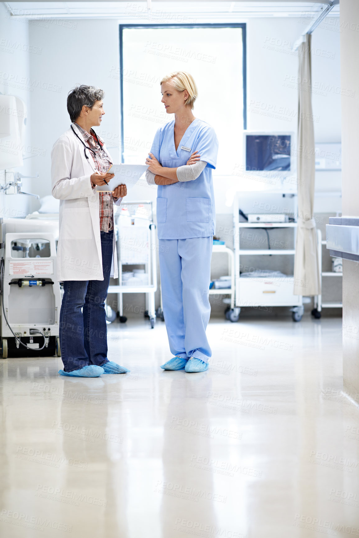 Buy stock photo Doctor, medical and nurse in hospital at clipboard, compliance and patient chart for diagnosis. Healthcare, people and collaboration in workplace with checklist, pathology results and surgery outcome