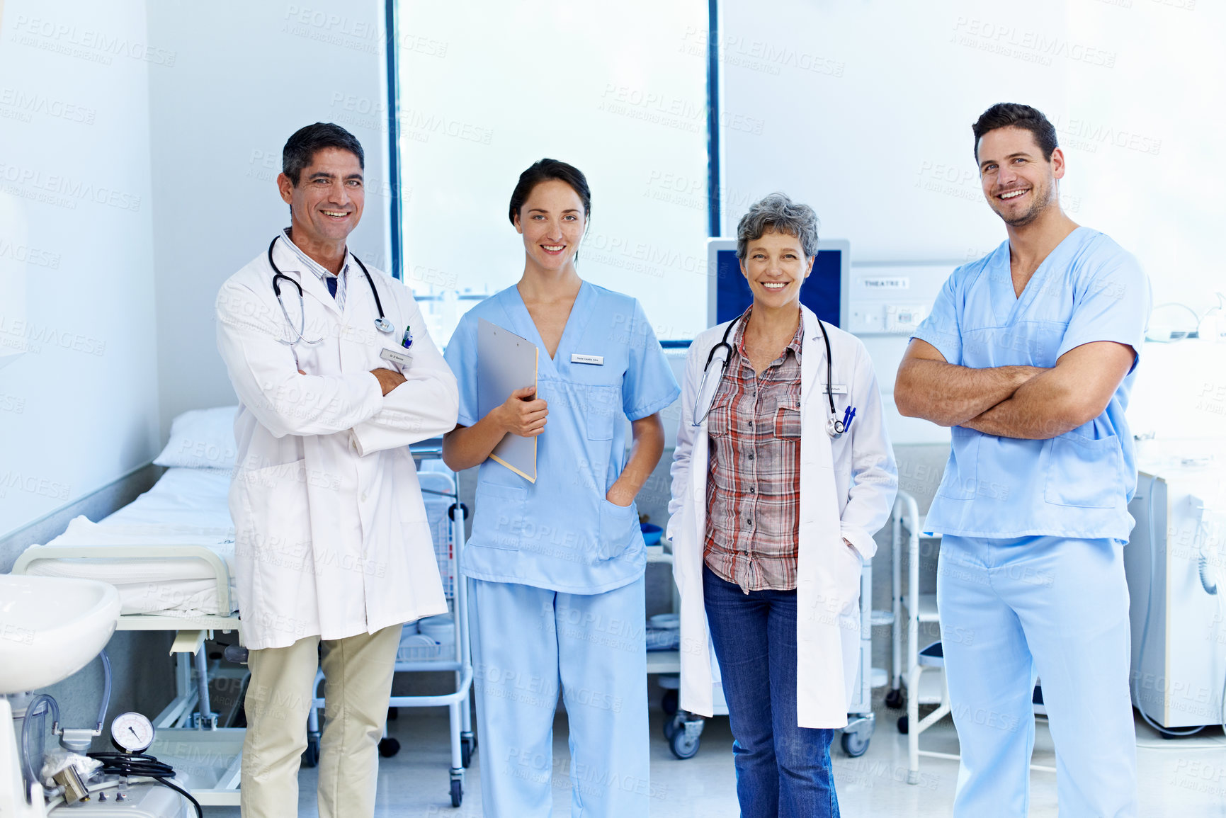 Buy stock photo Portrait of successful team of doctors in a hospital