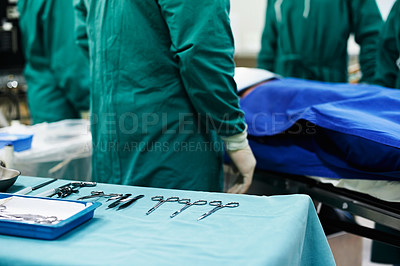 Buy stock photo Closeup shot of surgical instruments on a table in an operating room