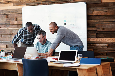 Buy stock photo Cropped shot of three businessmen in an office