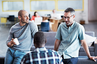 Buy stock photo Cropped shot of three businessmen in an office