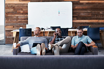 Buy stock photo Cropped shot of three businessmen in an office