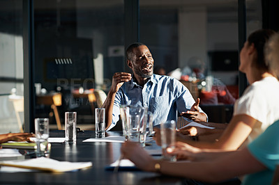 Buy stock photo Cropped shot of a business meeting in progress