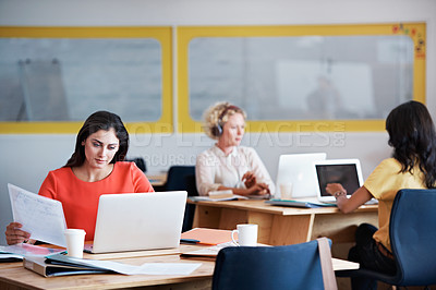 Buy stock photo Cropped shot of three businesswoman in an office