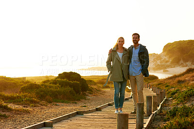 Buy stock photo Shot of an adventurous couple spending time in the outdoors