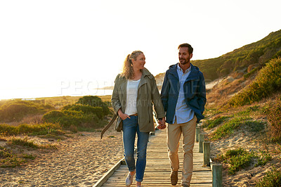 Buy stock photo Shot of an adventurous couple spending time in the outdoors