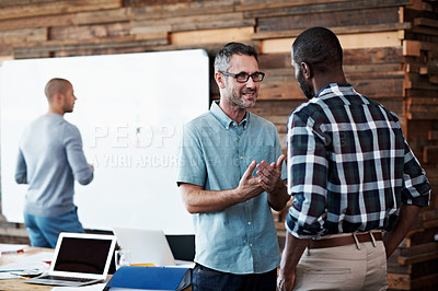Buy stock photo Cropped shot of three businessmen in an office