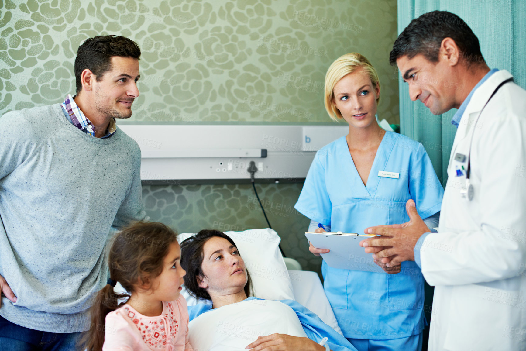 Buy stock photo Doctor, man and patient in hospital bed with conversation, feedback or news for diagnosis. Medical service, woman and family in clinic with healthcare, nurse and test results for healing or recovery