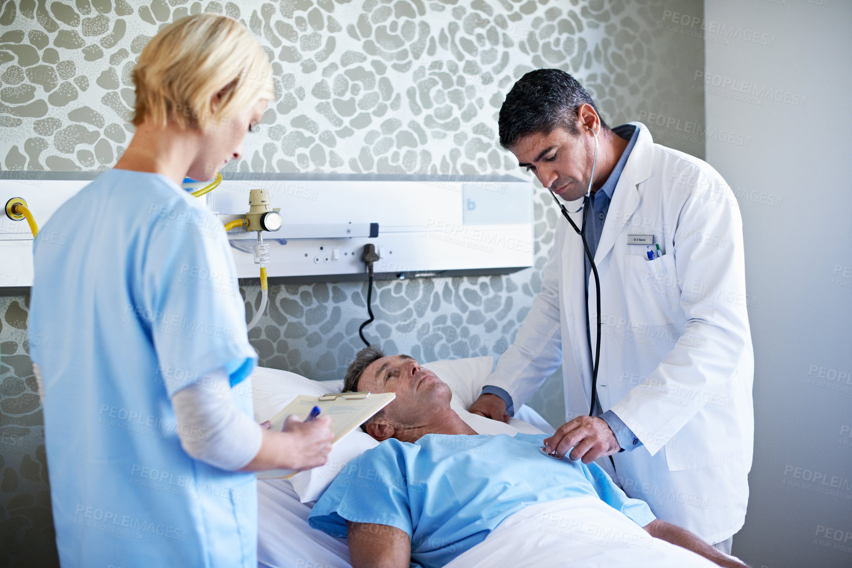 Buy stock photo Nurse, stethoscope and doctor with patient in hospital for checkup, surgery schedule and evaluation. Medical records, treatment plan and vitals checklist with people in clinic for heart rate report