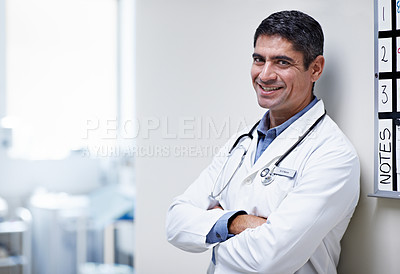 Buy stock photo Portrait of a doctor standing by a shift schedule in a hospital