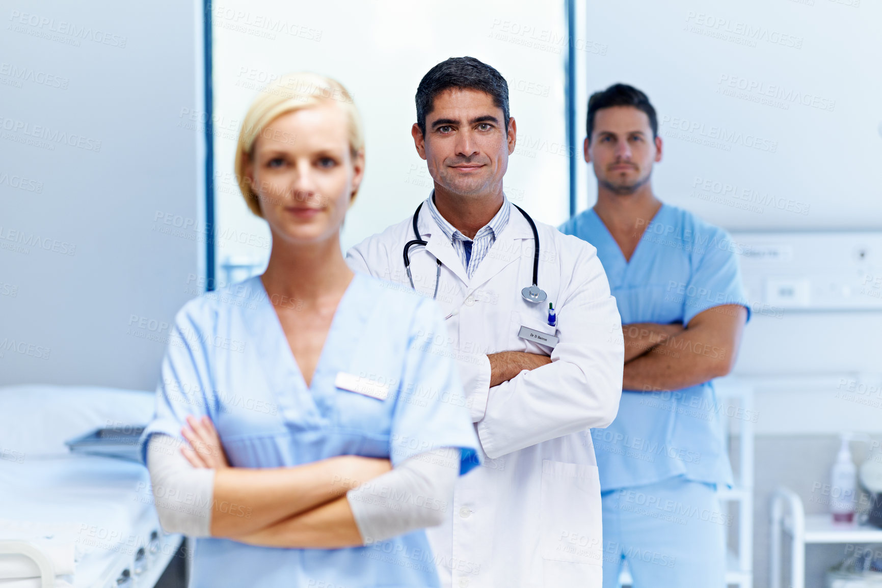 Buy stock photo Doctor, team and arms crossed in clinic for medical support, primary healthcare and about us pride. Staff portrait, people and nurses with confidence in ward for patient care, health service or trust