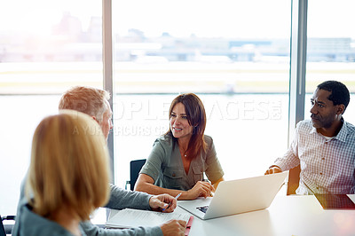 Buy stock photo Shot of a group of coworkers having a meeting in an office