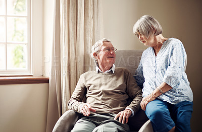 Buy stock photo Shot of a senior couple sharing an affectionate moment at home