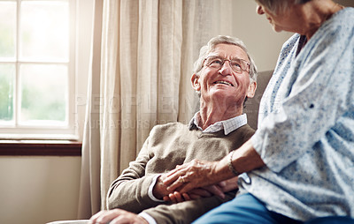 Buy stock photo Shot of a senior couple sharing an affectionate moment at home