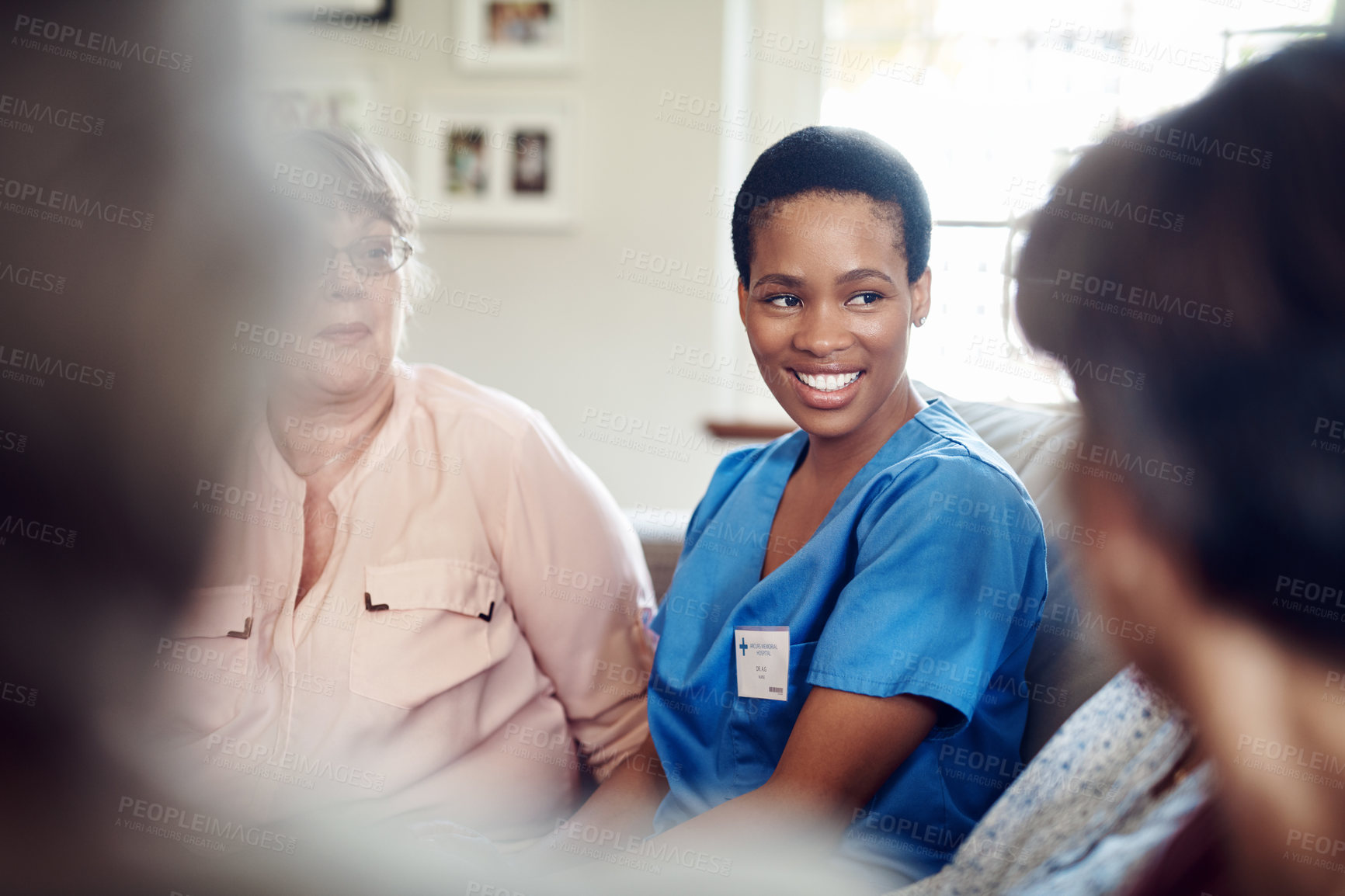 Buy stock photo Wellness, old people and nurse in lounge with chat, senior care and bonding together in house. Kindness, elderly patient and caregiver with conversation, connection or happy moment at retirement home