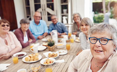Buy stock photo Cropped portrait of a happy senior woman sitting with her friends and taking a selfie during a tea party