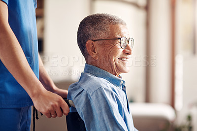 Buy stock photo Shot of a senior man in a wheelchair being cared for by a nurse at home