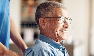 Buy stock photo Shot of a senior man in a wheelchair being cared for by a nurse at home