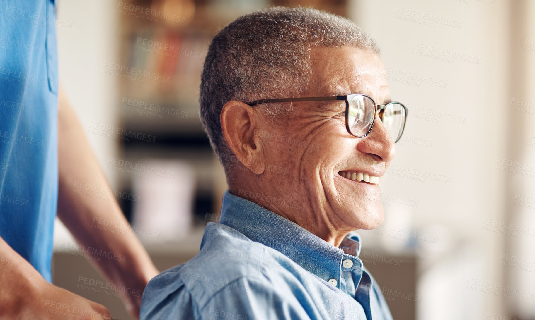 Buy stock photo Shot of a senior man in a wheelchair being cared for by a nurse at home