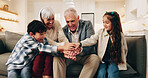 Hands, playing and grandparents with children on sofa for bonding, love and connection for visit. Family, stack and kids with grandma for relationship, games and relax together on weekend in home