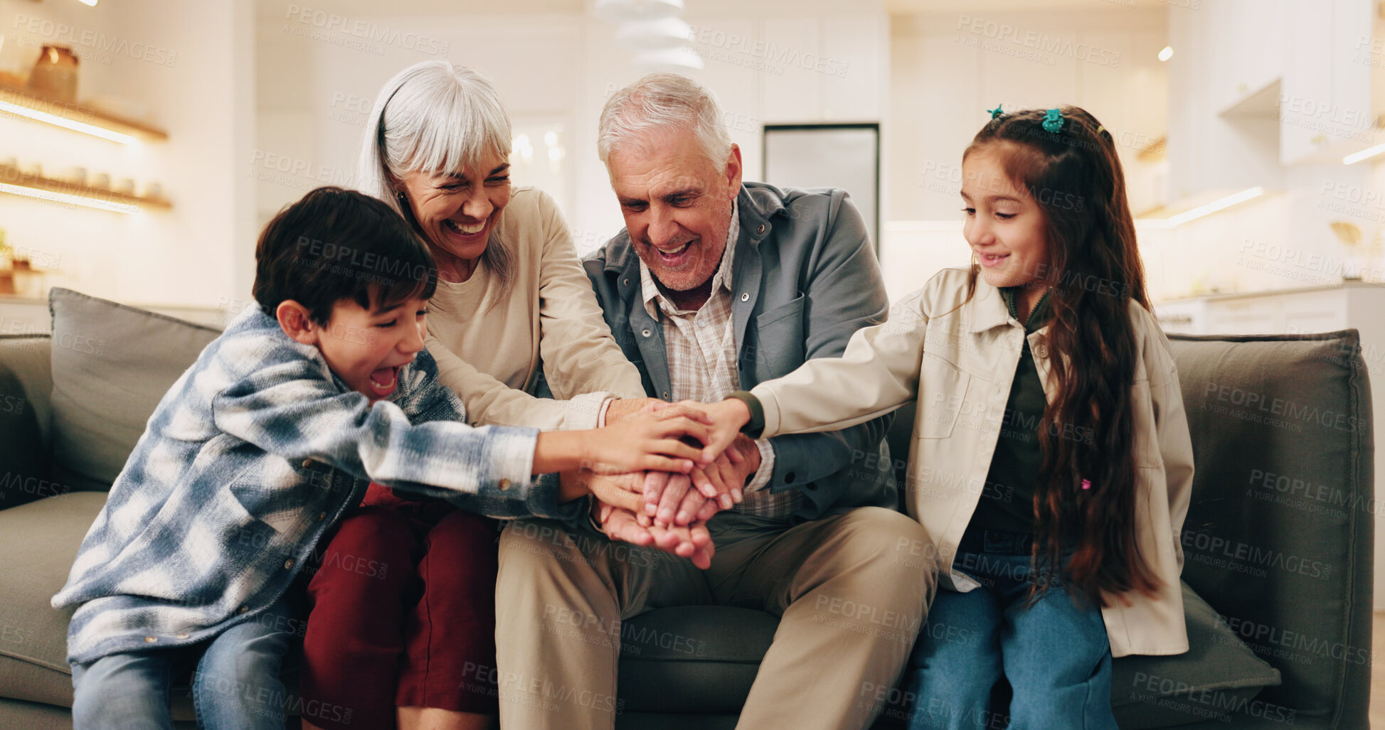 Buy stock photo Playing, grandparents and children with hands stack for bonding, love and connection for visit. Family, sofa and kids with senior people for relationship, games and relax together on weekend in home
