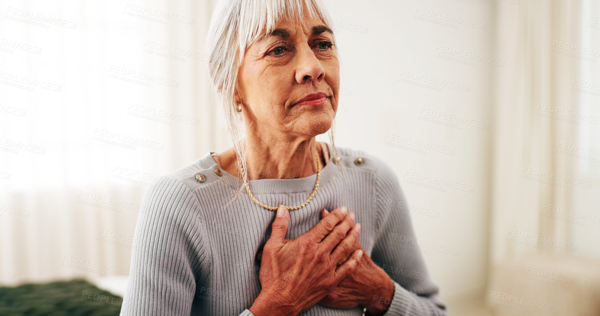 Buy stock photo Senior, woman or home with chest pain for cardiac arrest, respiratory infection or health condition. Elderly, female person or asthma with heart ache, chronic stress or high blood pressure in house