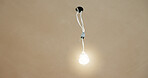 Ceiling, wire and light in home for fitting, electrical compliance and incomplete infrastructure. Renovation, remodeling and lightbulb in house for circuit testing, installation and outlet with space