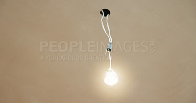 Buy stock photo Ceiling, wire and light in home for fitting, electrical compliance and incomplete infrastructure. Renovation, remodeling and lightbulb in house for circuit testing, installation and outlet with space