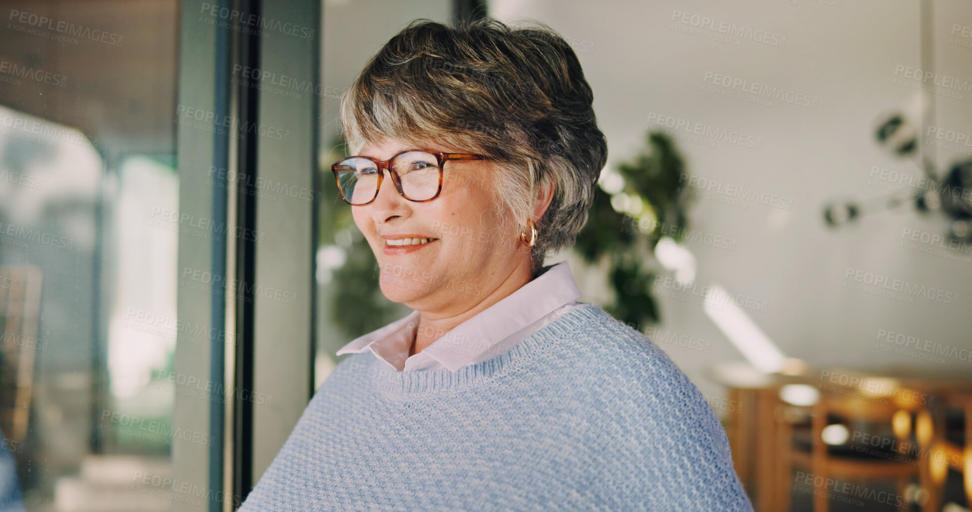 Buy stock photo Thinking, smile and senior woman by window with optimism, contemplating and vision at home. Retirement, happy person and reflection in house with perspective, positive mindset and introspection