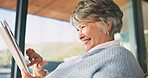Tablet, happy and senior woman in home reading blog on retirement planning for finance advice. Digital technology, update and elderly person on website for article with tips on pension savings.