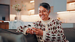 Phone, relax and woman on sofa in home with reading blog for news update, social media or texting. Happy, technology and mature person with cellphone for website notification on mobile app in house.